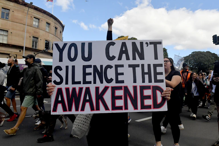 Protesters march at the ‘World Wide Rally For Freedom’ rally at Hyde Park in Sydney, Saturday, July 24 2021
