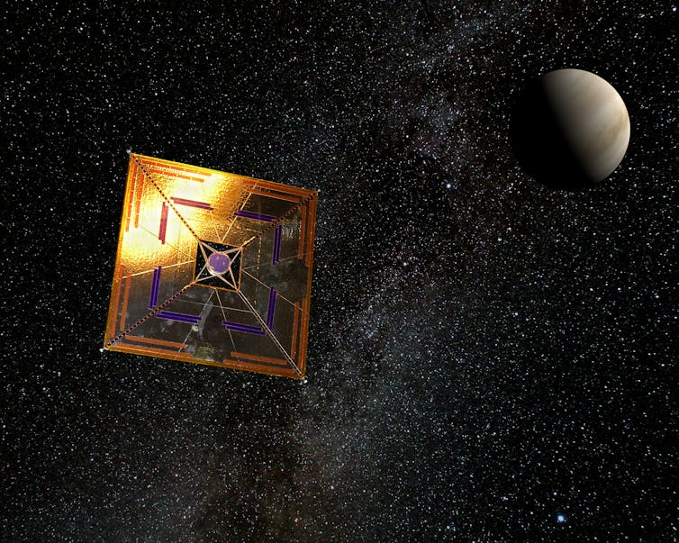 A shiny golden-hued square with a small spacecraft attached in space with a planet in the background.