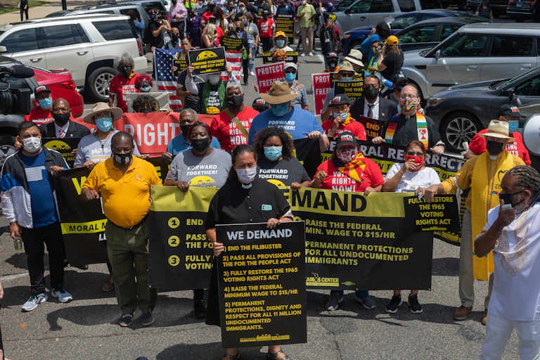 Low-wage workers march.