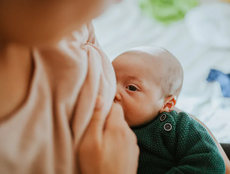 baby at mother's breast