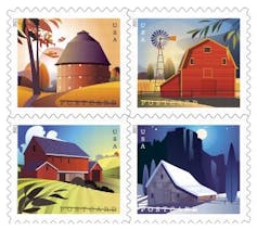 Four stamp designs show classic styles of American barns.