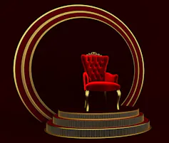 A throne seen on a stage.
