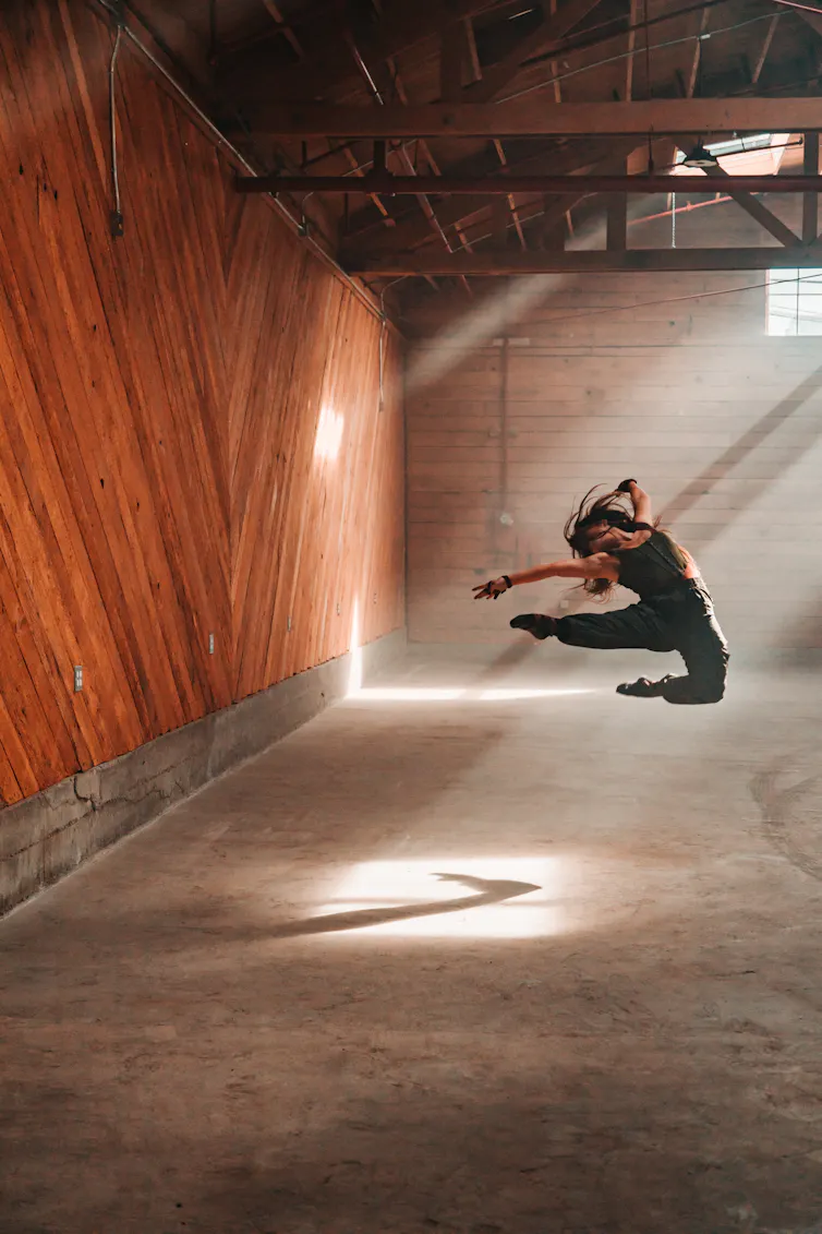 Dancer jumping in studio
