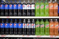 Soda bottles on retail shelves