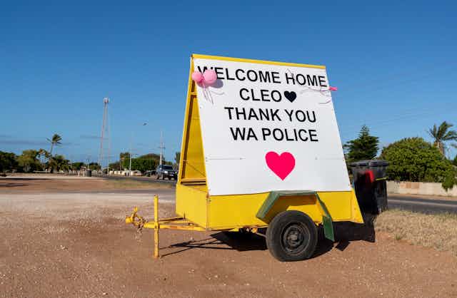 Trailer with 'Welcome home Cleo. Thank you WA police' sign