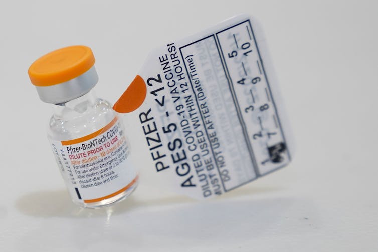 A vial of Pfizer-BioNTech COVID-19 vaccine for children, with a tag indicating it is for ages five to 11