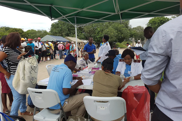 people filing for malaria tests