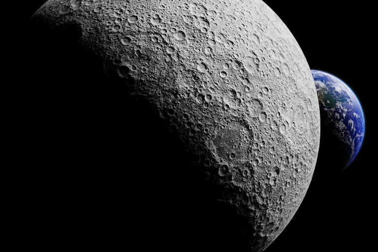 An image of the far side of the moon in shadow with Earth behind in the background.