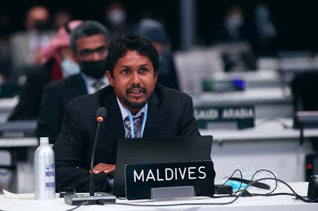 A representative from the Maldives speaks at the COP26