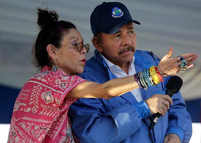 Nicaragua's vice president Rosario Murillo gesticulates to her husband Nicaraguan President Daniel Ortega.