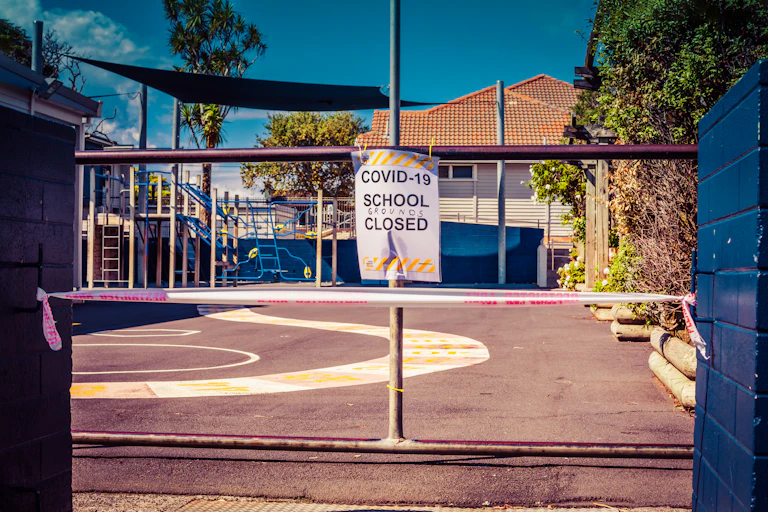 empty school playground with closed sign