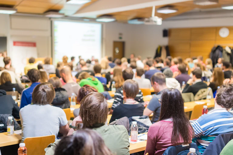Large university class listens to lecture