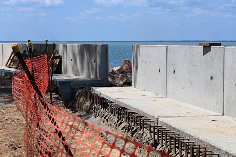 A concrete seawall.