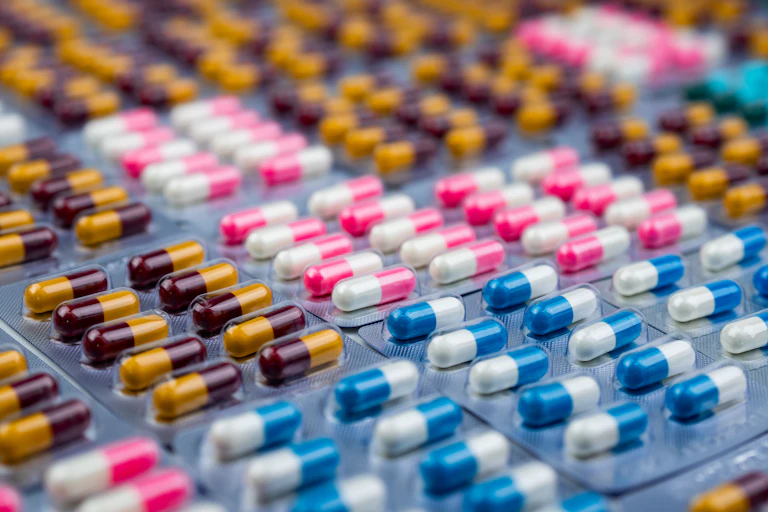 Close up of colorful pills in blister packs