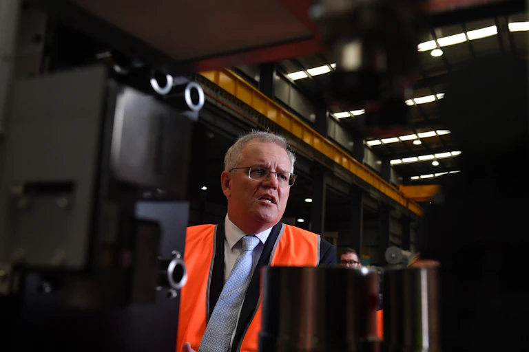 man in orange vest