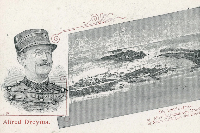 An old, black and white postcard shows a drawing of a military officer and a remote island.