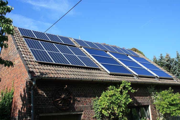 Combined heat and power solar installation on a barn roof