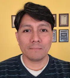 A headshot of brown-eyed, brown-haired Benny Polacca, senior reporter at the Osage News in Pawhuska, Oklahoma.
