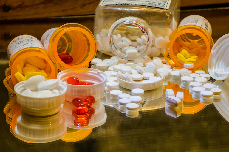 pills spilling from bottles