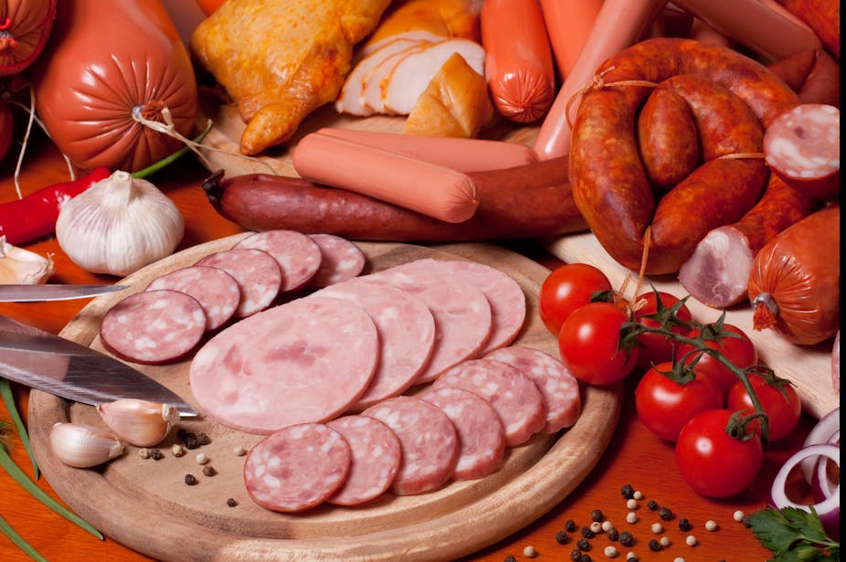 An assortment of processed meats, including sausage and chorizo.