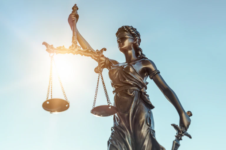 Statue of blind justice with scales