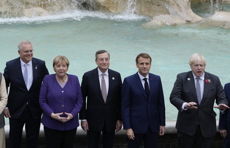 Scott Morrison and world leaders pose for a group photo at the G20.