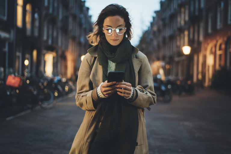 A woman on her smartphone.