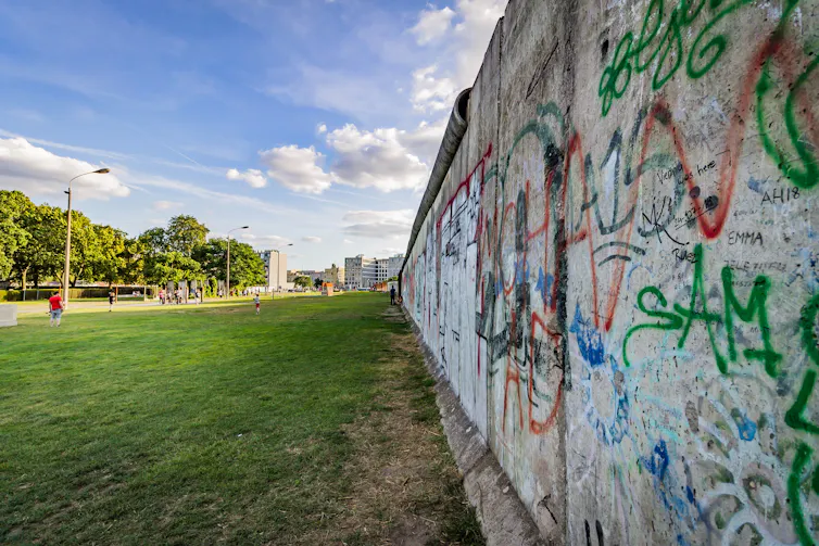 An image of a portion of spraypainted wall.
