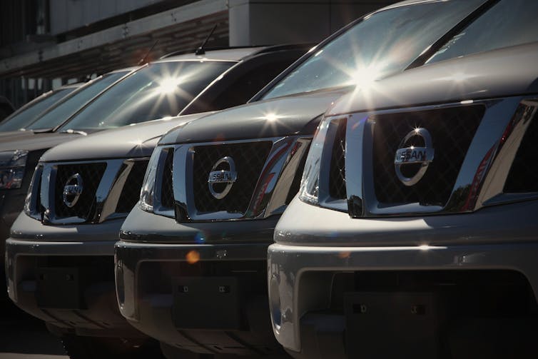 silver cars in row