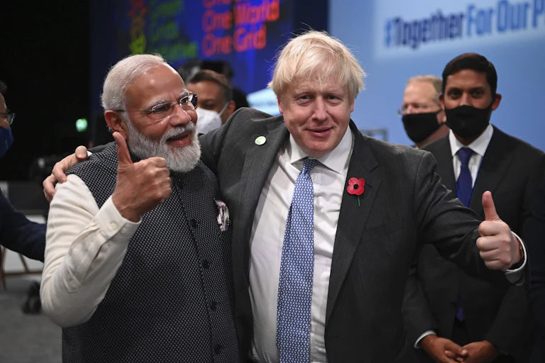 two men give thumbs up
