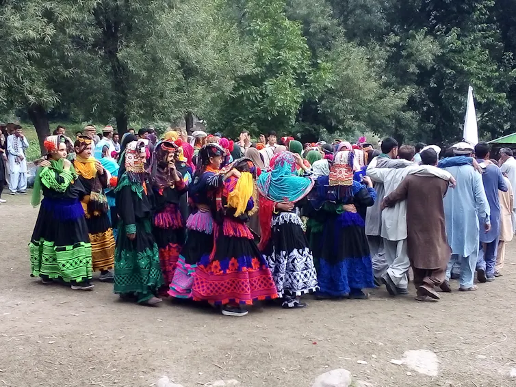 A group of people in a circle.