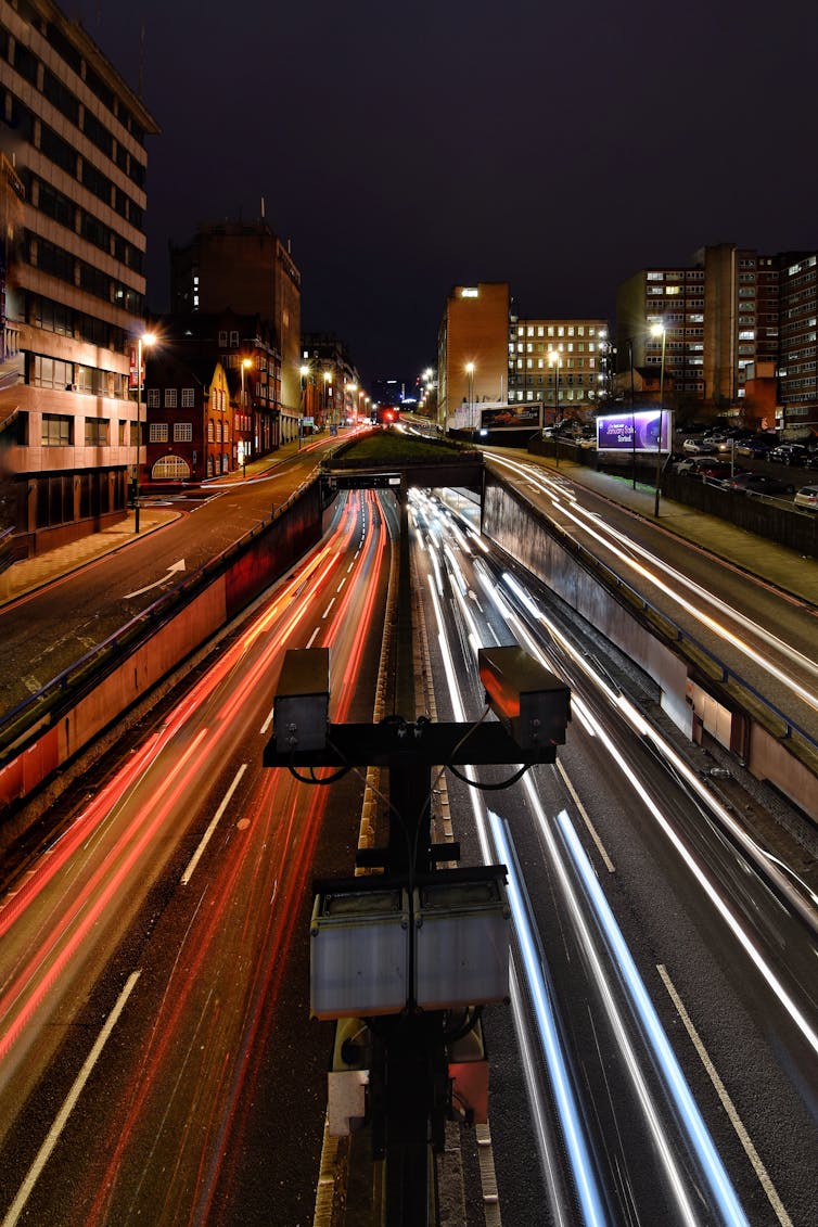 Cars speed on an underpass in Birmingham