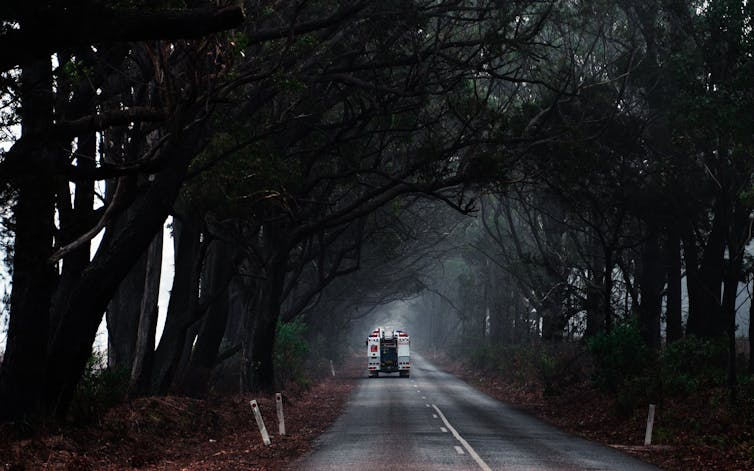 firetruck on blackened road