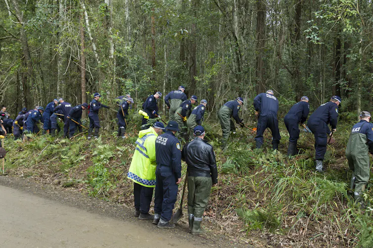 NSW police search bushland at Batar Creek in 2018.