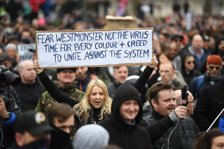 UK Demonstration with banner against Westminster and not the virus