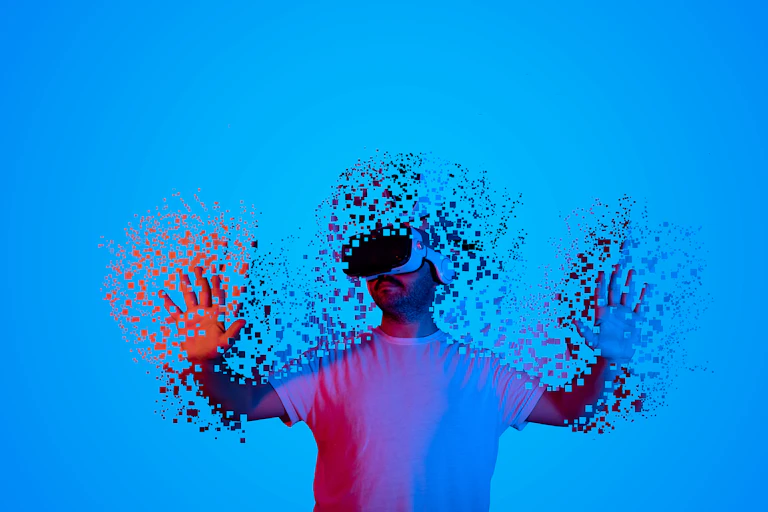 A man wearing a white tee and a VR headset reaches out and is getting pixelated