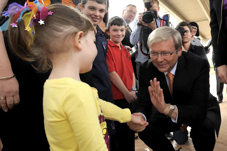Kevin Rudd greets children at Amaroo school in Canberra, where he released the curriculum. March 1 2010