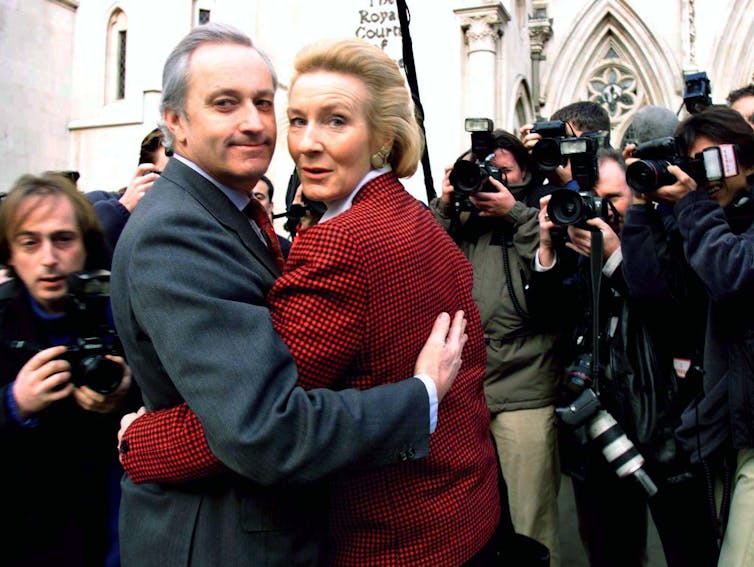 Neil Hamilton with his wife Christine outside the Royal Courts of Justice.
