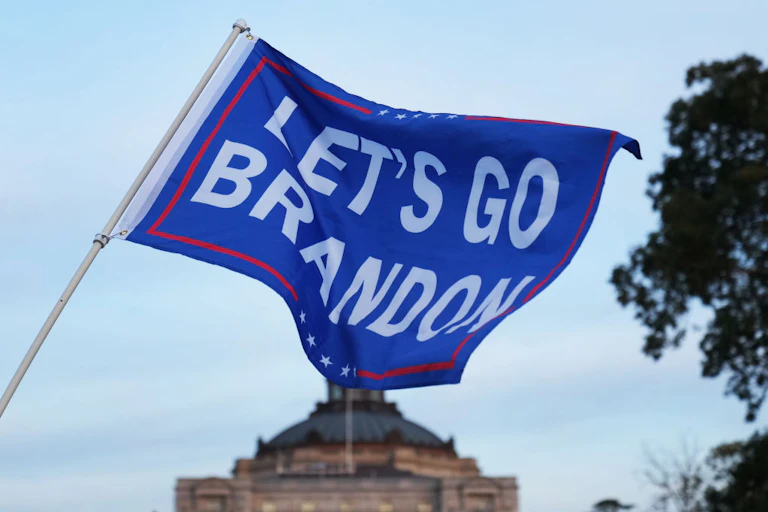 Red, white and blue flag waving.