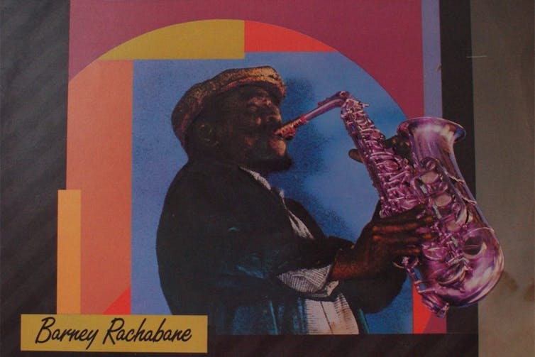 An image of a bearded man in a beret playing the saxophone against a multicolored graphic design background