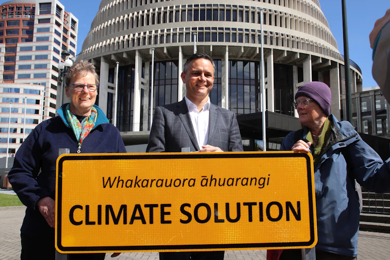 Climate chaneg minister James Shaw with protesters