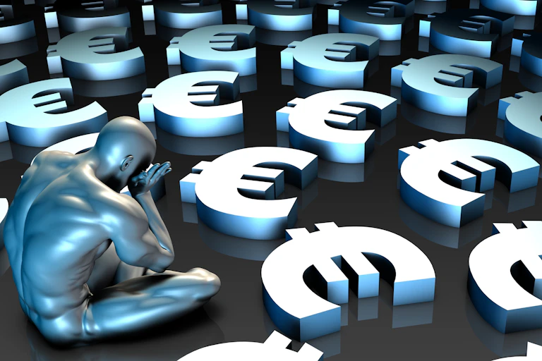 Metal man crying next to lots of euro symbols