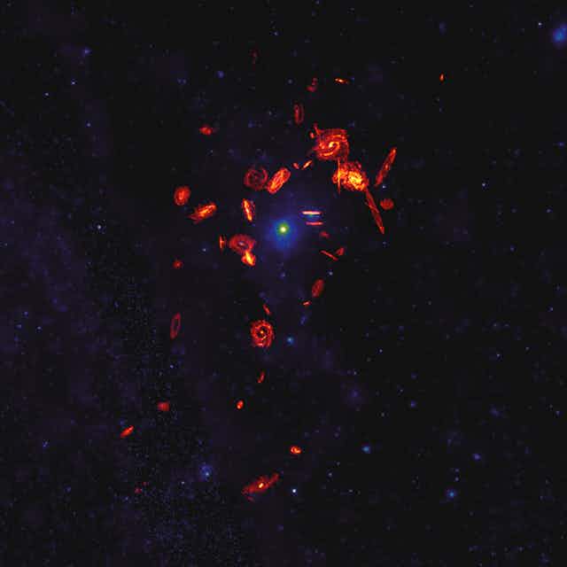 orange spiral galaxies on a dark navy blue universe background
