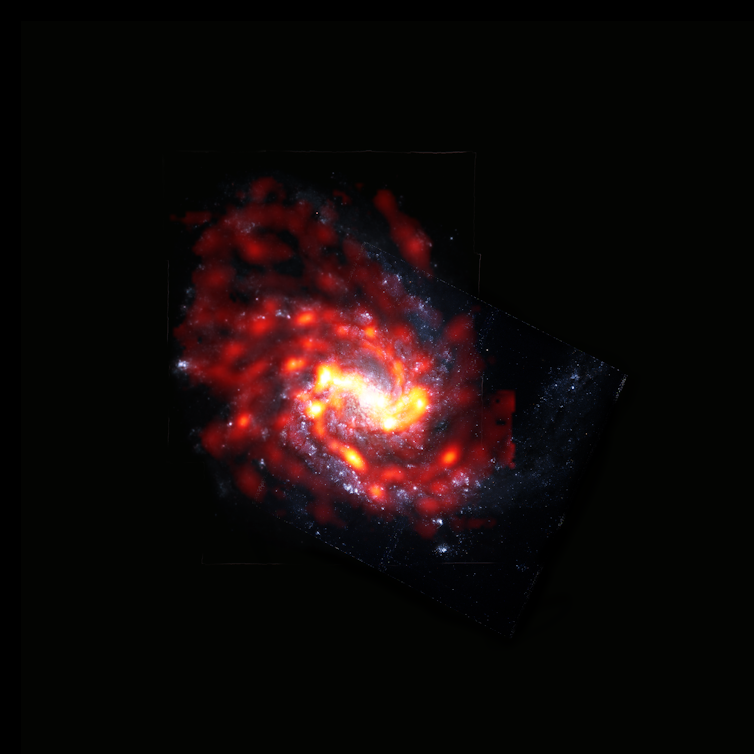 Why It'S Location, Location, Location, Even When It Comes To Galaxy Evolution 3 A Striking Image Of An Orange Spiral Galaxy On A Dark Background