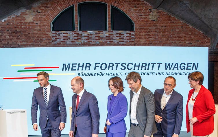 The leaders of Germany's new governing coalition at a press conference.