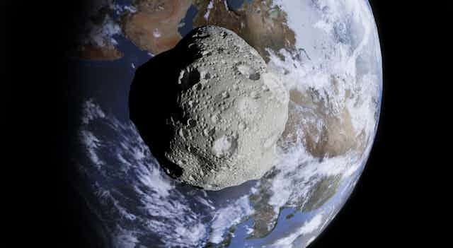 Asteroid superimposed over Earth