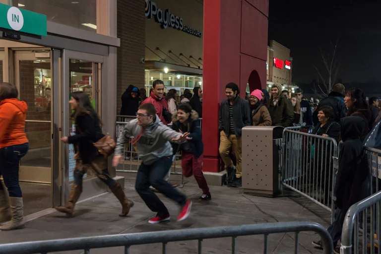 People run into a store