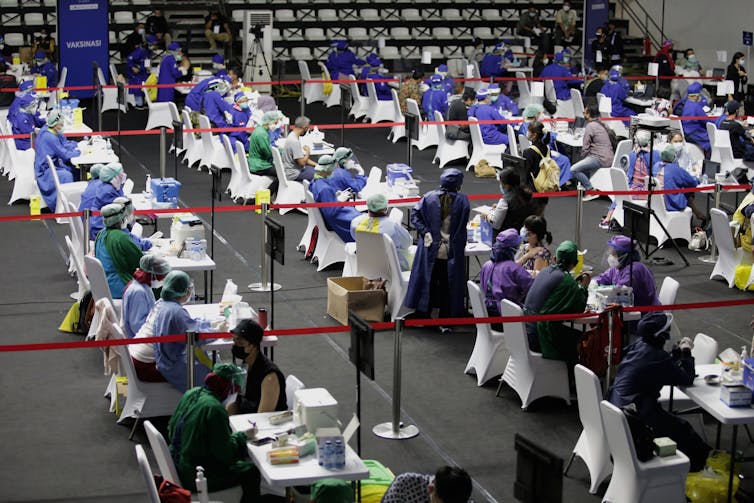 Mass vaccination clinic in Indonesia.