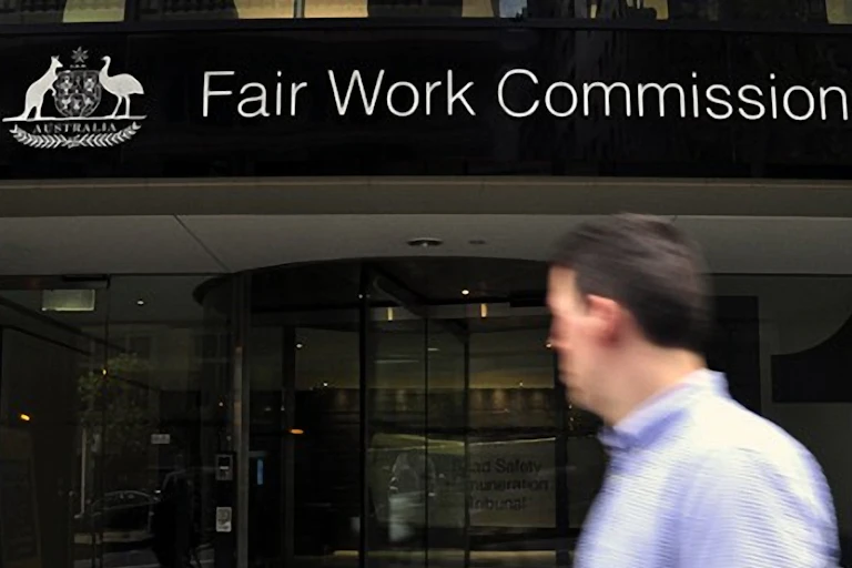 Man walks past Fair Work Commission