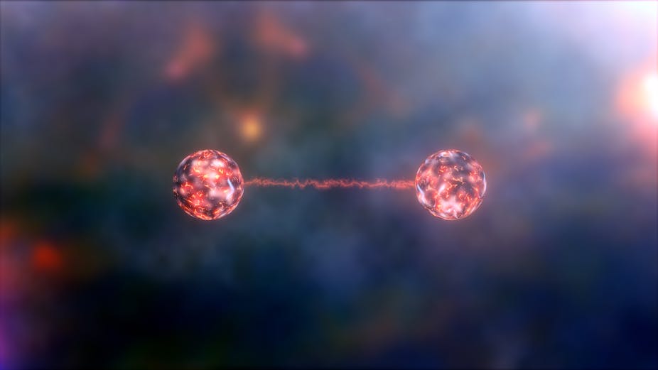 An illustration of two glowing reddish-blue orbs that appear to be connected by a flash of red light